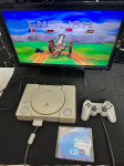 Sony Playstation 1,chipirani,orginal joystick,kablovi,2 igrice !