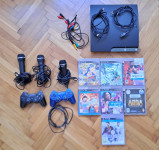 Playstation 3 + 2 controllera + 3 mikrofona + 7 igrica