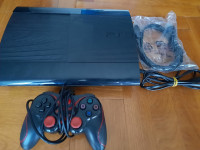 Playstation 3 Super Slim 465 GB + oprema i igre