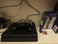 Playstation 4 + igre i torba
