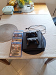 PlayStation 4 Slim 1 TB + 4 igrice gratis - odlično stanje