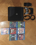 PS4 Pro 1TB + 2 yojstick + dock + 7 igrica