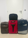 3 kofera i kozmetička torba