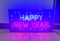 svjetleći natpis"happy new year"47x25cm