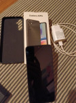 Samsung Galaxy A05s sa maskom i punjačem
