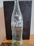 Staklene boce Coca-cole iz 1983. godine