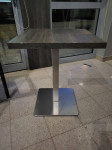 Stolovi, inox postolje.