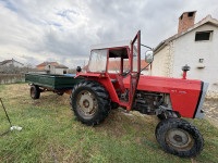 Prodajem traktor IMT 560 sa prikolicom i plugom.