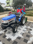 Traktor Iseki sa malčerom, plugom i transportnim platoom