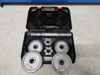 Štanga + 2x2kg + 2x1kg utezi + kofer