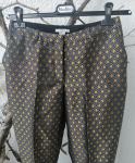 Fine H&M hlače sa srebrno-zlatnim uzorkom