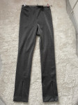 h&m svjetlucave hlače 36/38 novo