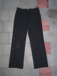 Ženske elegantne hlače na crtu s manžetama vel. 38