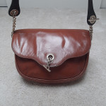 Smeđa mala kožna torba Pollini