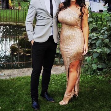 Asimetrična svečana haljina rozo zlatna, s izrezom ,resice i šljokice