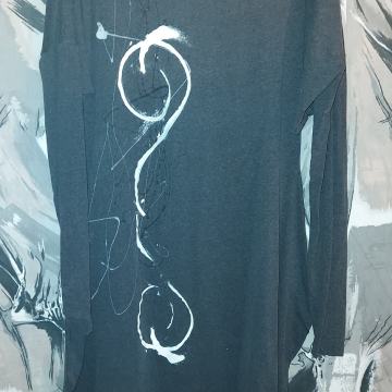 Topla haljina zanimljivog kroja