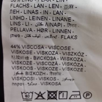 Ženski kombinezon čisto crni na tanke naramenice koje se vežu u križ n