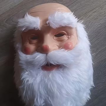 Smiješna maska ​​Djeda Mraza s crvenim šeširom i bijelom bradom