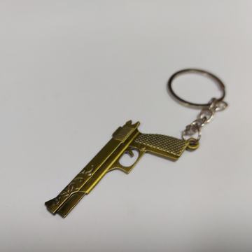 Privjesak za ključeve pištolj