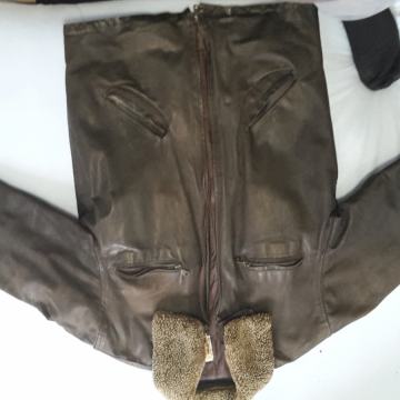 muška kožna jakna s krznom