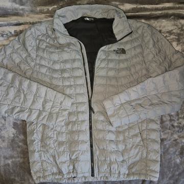 The North Face muška puffer jakna siva