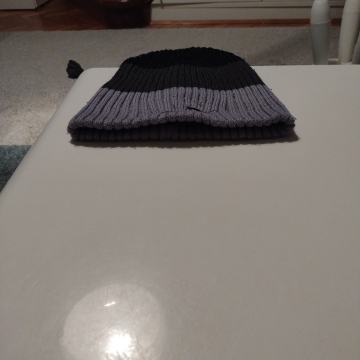 crno-siva zimska kapa kupljena prije desetak-petnaestak godina PUmA