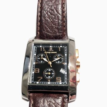 Jacques Lemans muški sat u odličnom stanju, smeđa kožna narukvica.