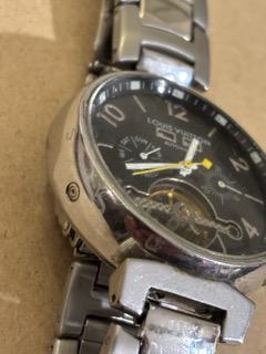 Louise Vuitton Tambour, automatic, calendar