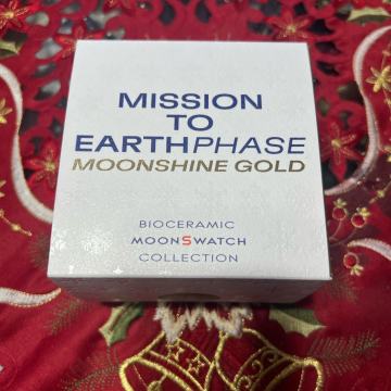 Omega x Swatch Mission to Earthphase Moonshine Gold
