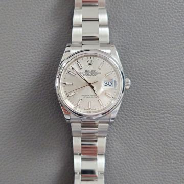 Rolex Datejust 126200, silver stick dial, 36mm