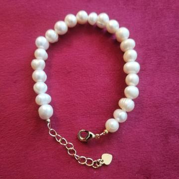 Biserna narukvica (pravi biseri) sa srebrnom (925)pozlaćenom kopčom