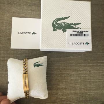 Lacoste zlatna narukvica