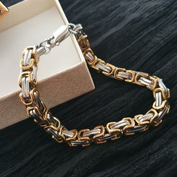 Narukvica kirurški čelik kraljevski vez 7 mm sa pozlatom