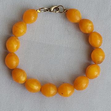 NARUKVICA. Narančasta. 22 cm. Mob