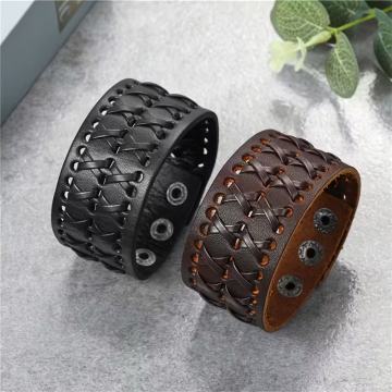 Široka kožna narukvica u vintage stilu s dvostrukim redom X uzorka