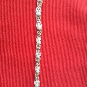 Srebrna filigranska narukvica....ručni rad s plavim kamenčićima