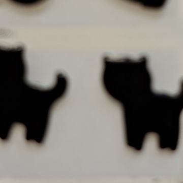 Crne naušnice mačka maca