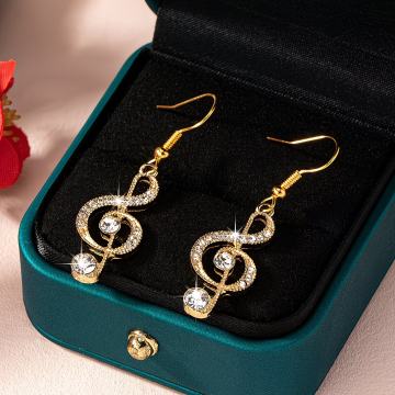 Elegantne viseće naušnice s notama i svjetlucavim cirkonima