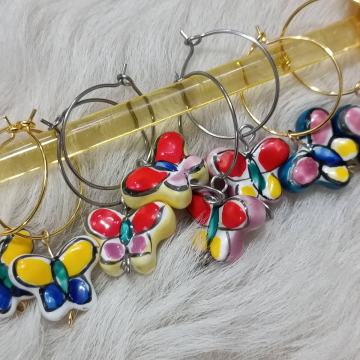 Naušnice od čelika sa keramičkim leptirićem