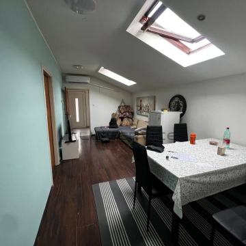 Obiteljska kuća s garažom i okućnicom u kvartu Peščenica 120m2