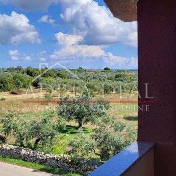 Stan od 55 m² s pogledom na more i mali studio-apartman od 25 m², potp