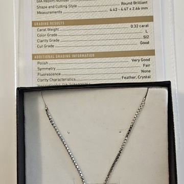 Zlatna 14k ogrlica sa dijamantom