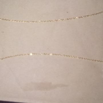 Zlatni lančić sa simbolom