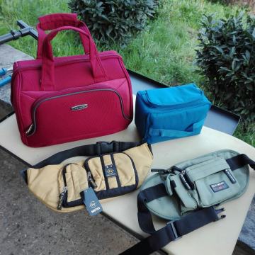 Torbica oko pasa 2 kom i 2 putne torbice