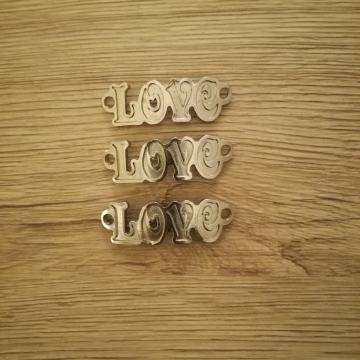 Niklani privjesci, love