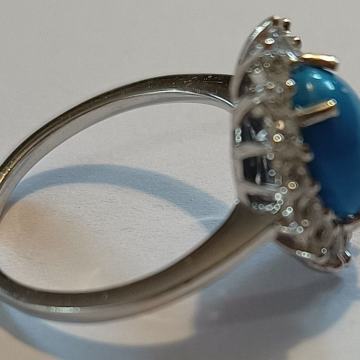 prsten sa plavim kamenom i bijelim cirkonima