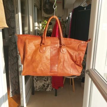 Harolds kožna putna torba