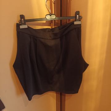 NOVA M 38 CRNA MINICA KRATKA SUKNJA ŠOS FALDE DŽEPOVI