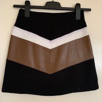 STADIVRIUS suknja s kožnim umetkom
