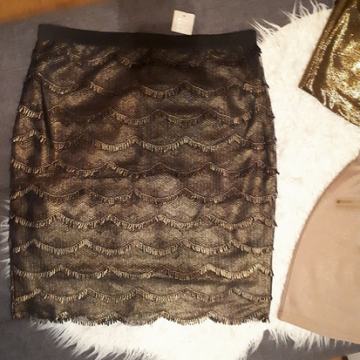 SUKNJA VEL. 40  NOVO